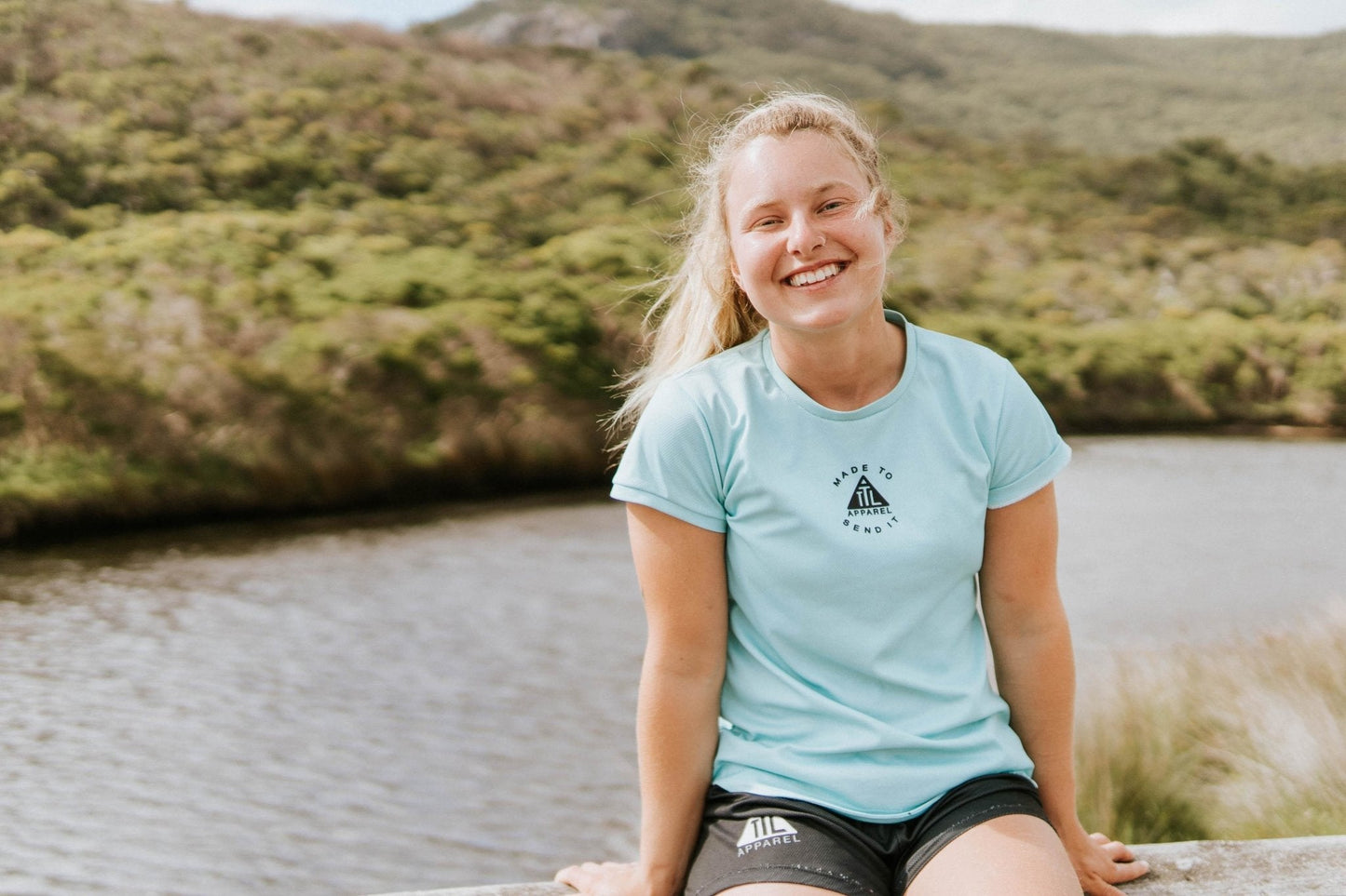 Women's running top in teal. Shirt is eco friendly following strict manufacturing process to reduce waste. This running and training top is made in Australia.