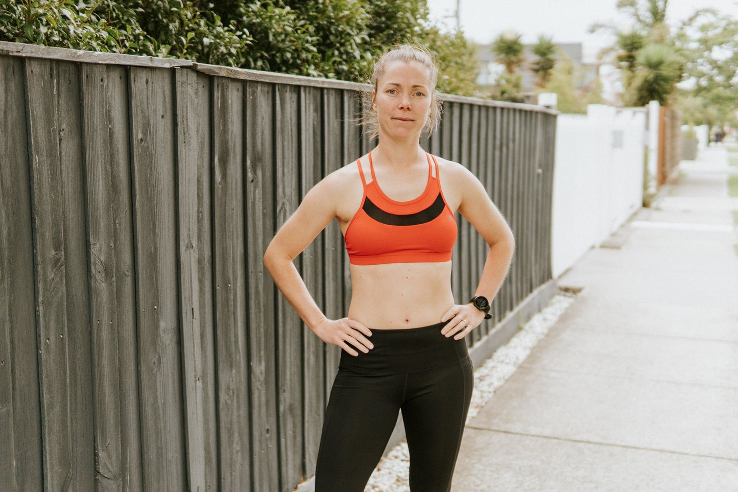 Medium support sports bra in red with breathable mesh to wick away sweat and moisture.