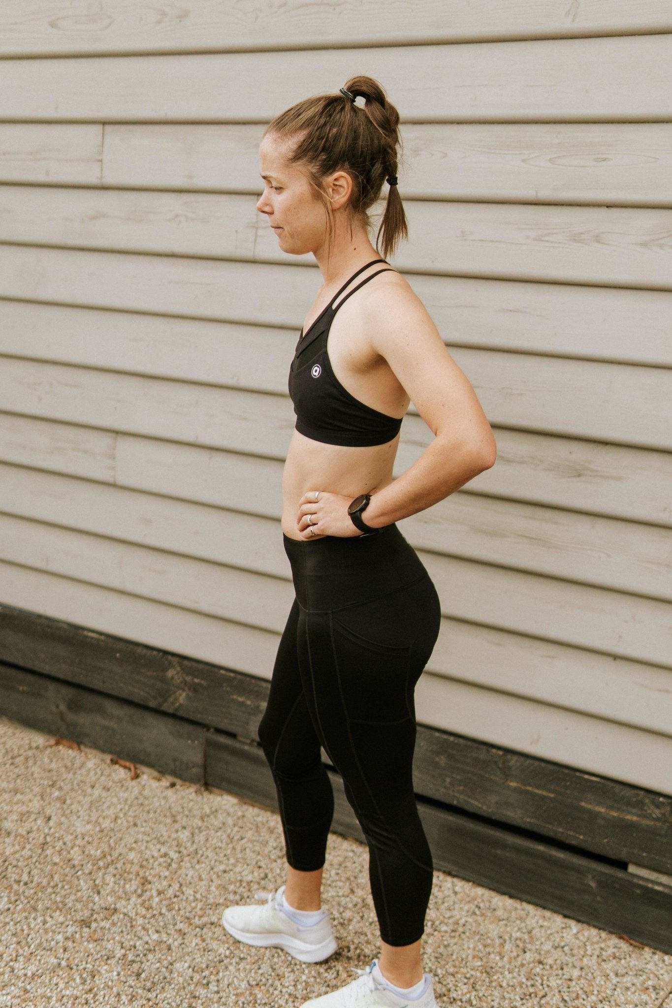 Medium support sports bra in black with breathable mesh.