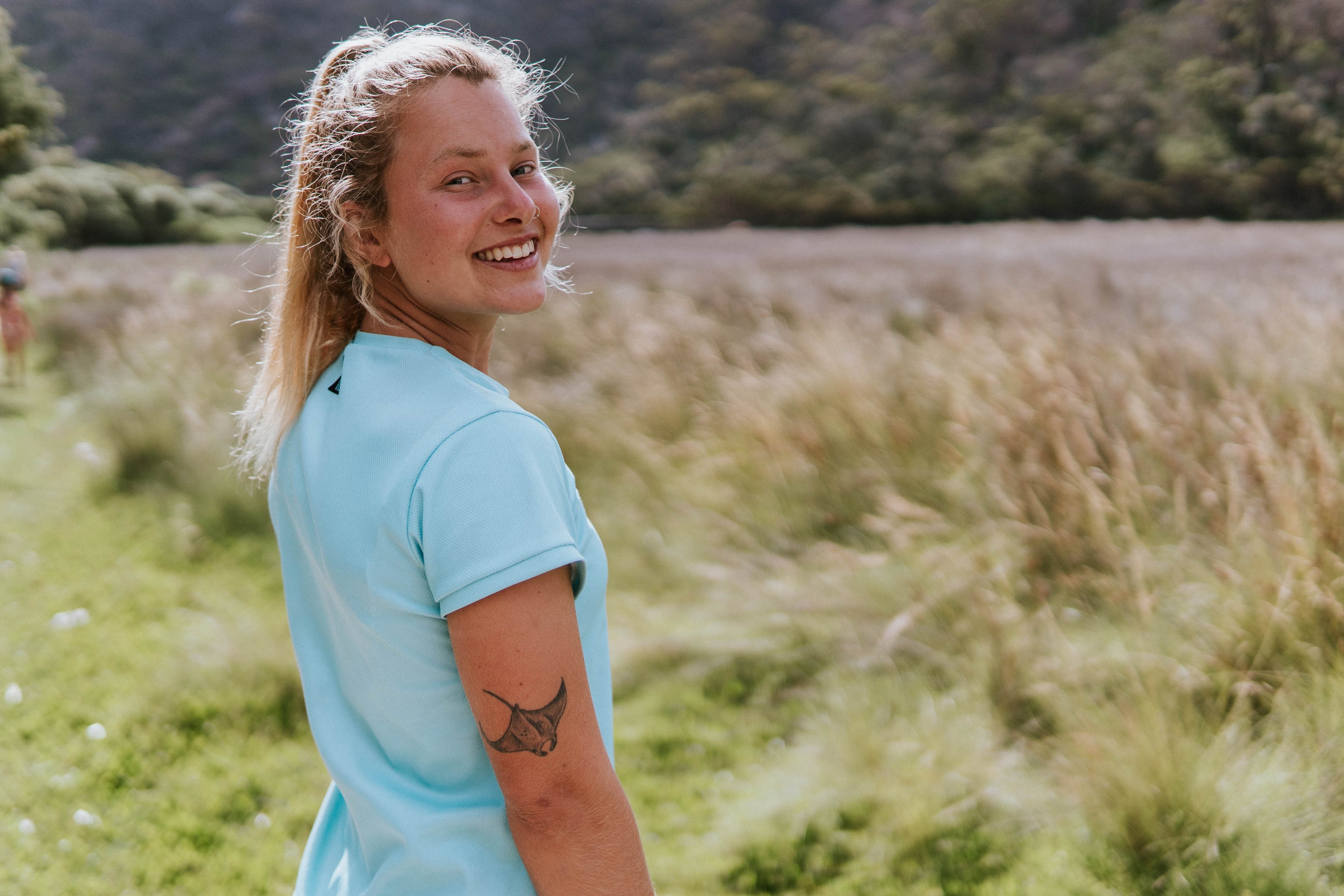 Women's running and training top in sky blue. This top is made in Australia from 100% recycled material. 