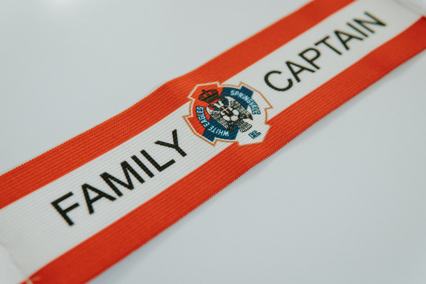 Custom made captains armband for soccer club in Australia. Custom to your team colours and badge.