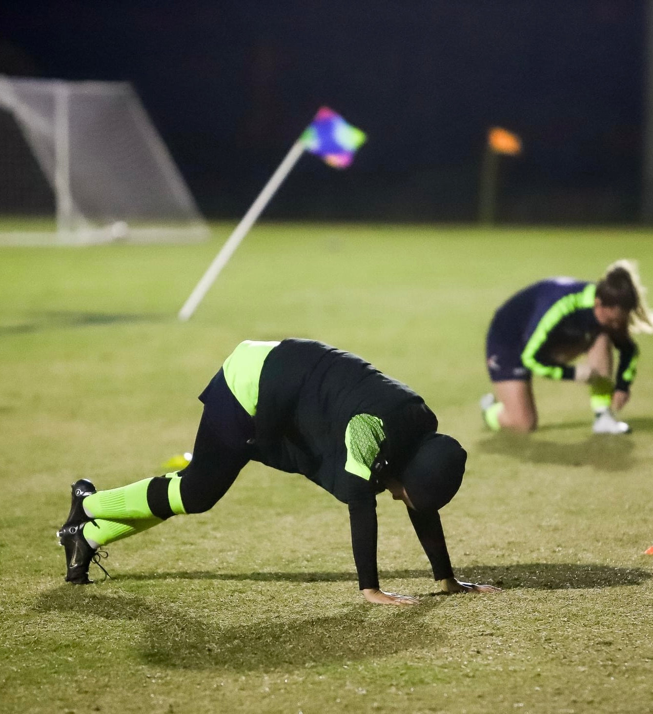 Nike Cup corner flags that were custom made with a rainbow design.