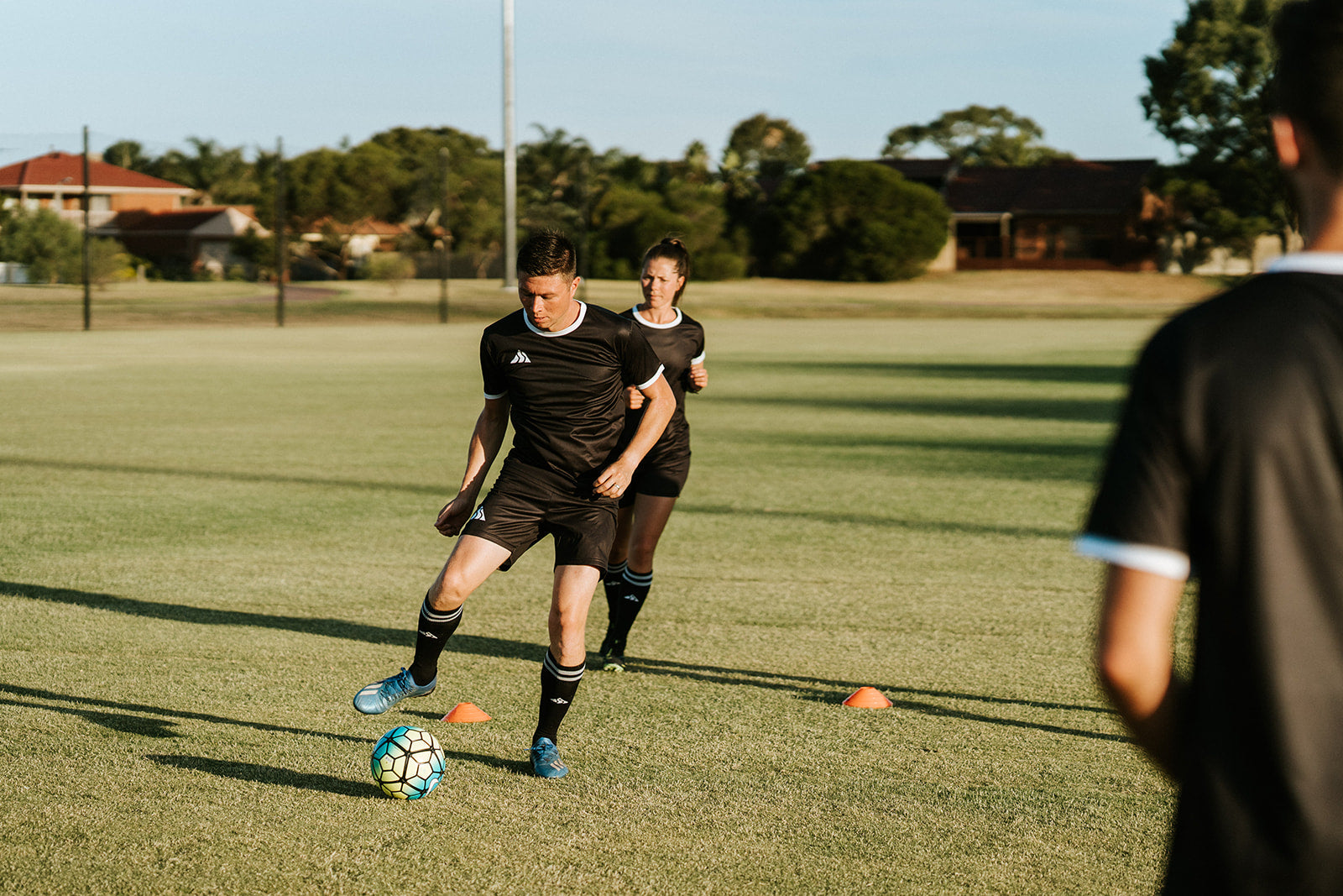 Mens training soccer/football apparel. Made in Australia from flexible breathable material keeping you dry in all conditions. Made to suit your team with custom colour, sponsors and logos.