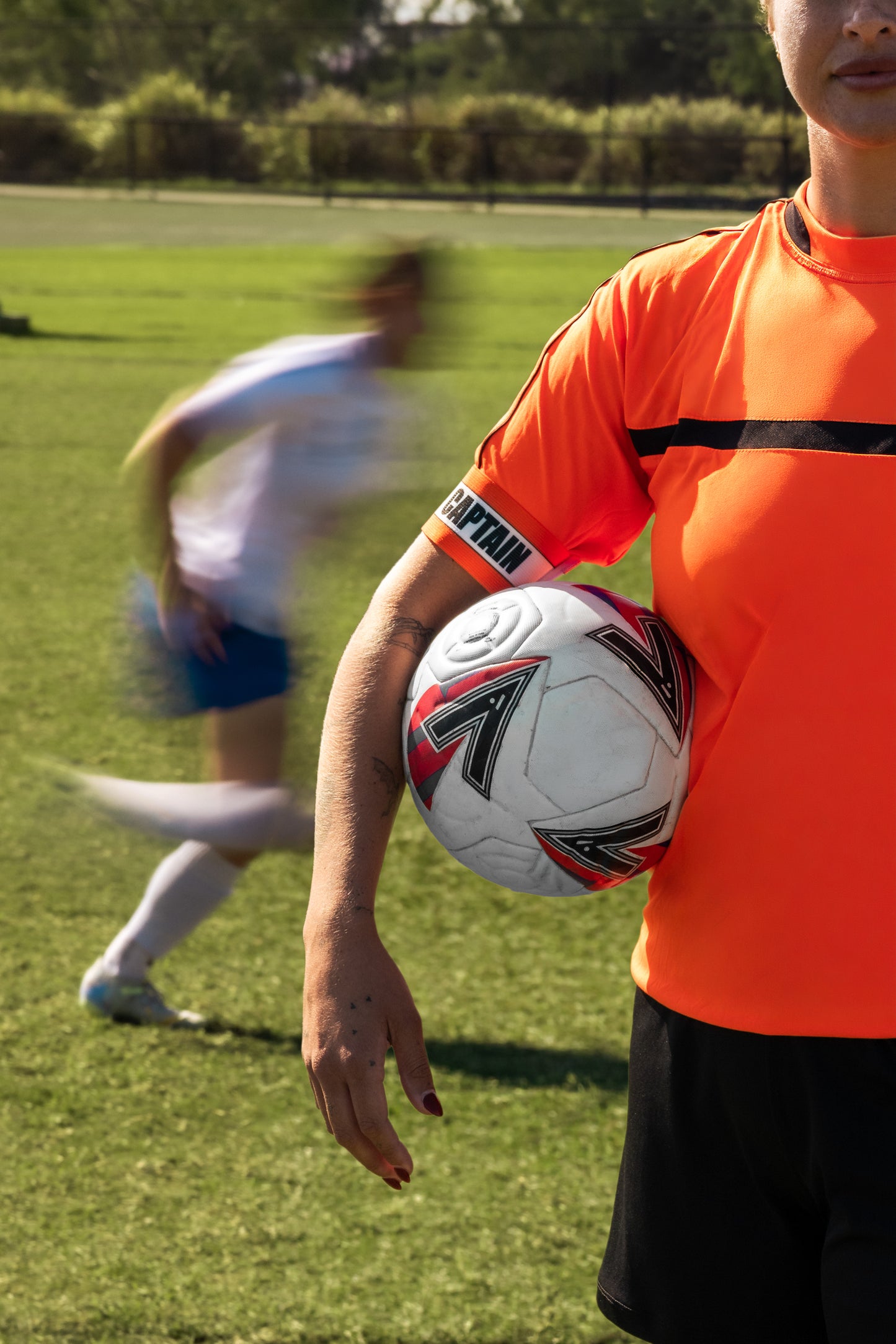 Personalised captain’s armband with custom colours and text for team sports