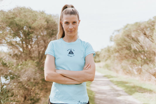 Women's running top in teal. Made for your favourite workout, run or training program. Made in Australia from recycled materials. 